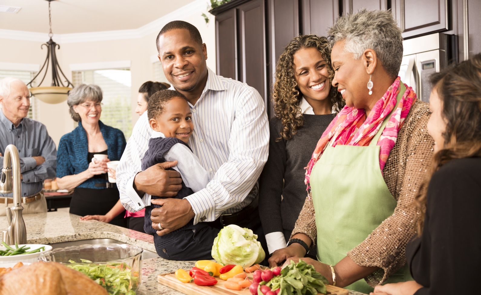 a family gathering in a kitchen