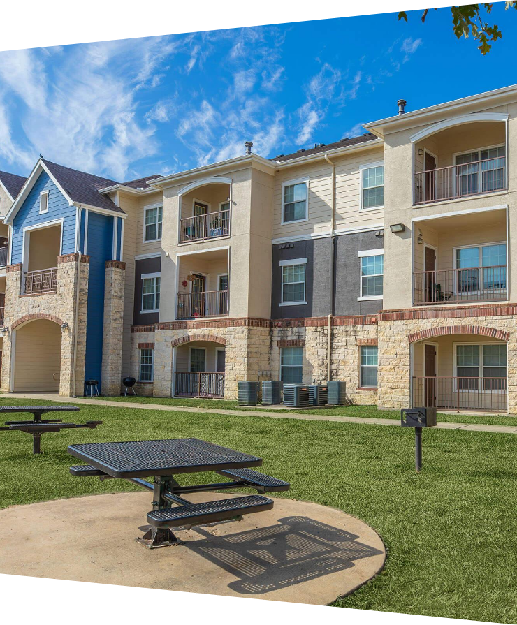 exterior of a three-story apartment complex